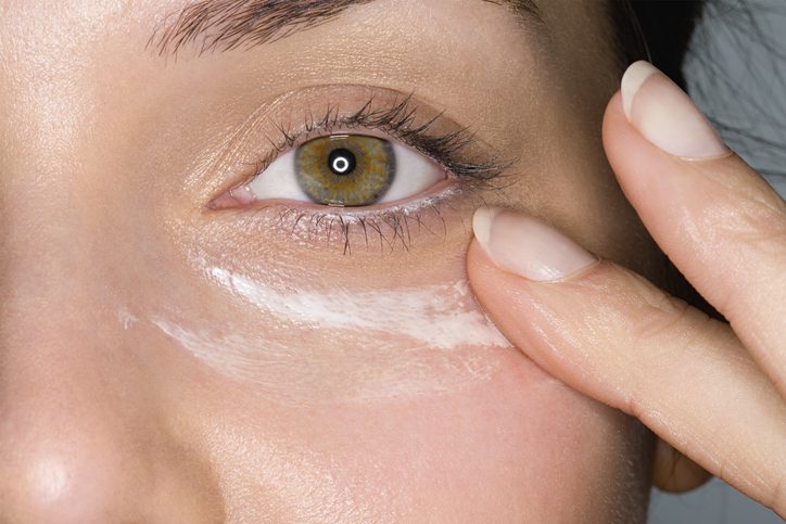 Woman applying Wrinkle Treatment Under Eyes